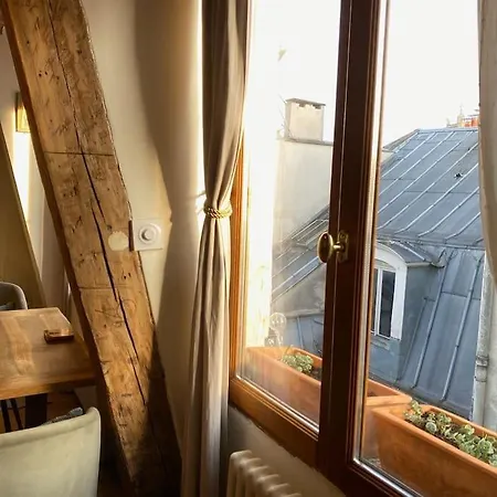 Duplex With Panoramic Views Over Париж